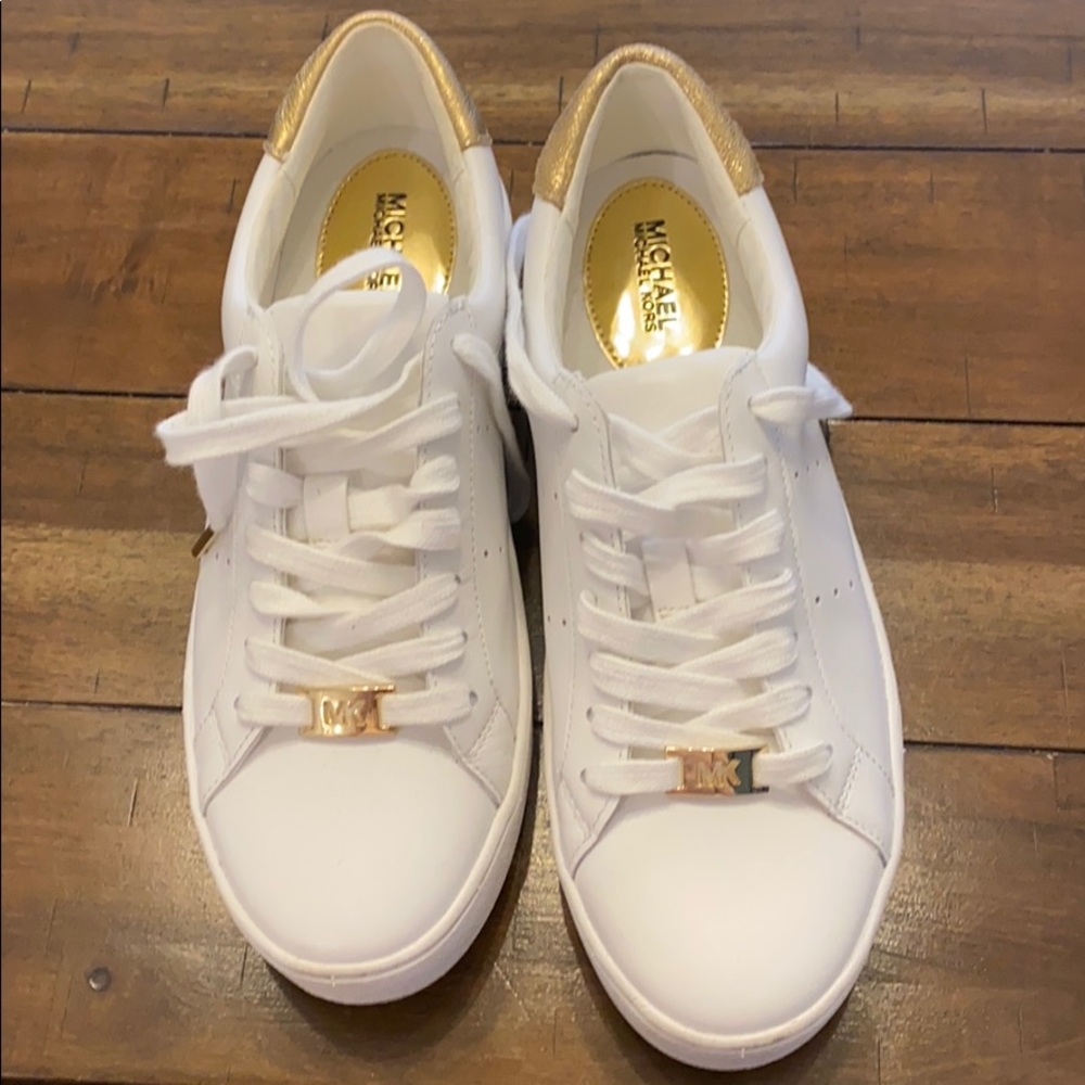 Micheal Kors white and gold sneakers